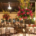 orchid,roses,bells of ireland centerpieces perla farms wedding flowers.